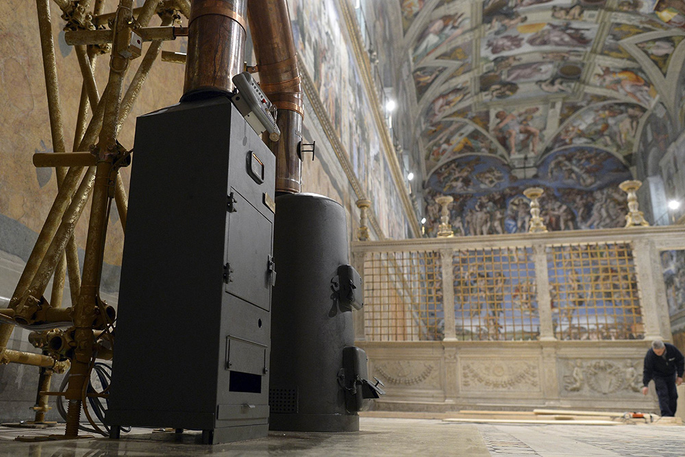 Stoves used to burn ballots during a papal conclave are seen in the Vatican's Sistine Chapel March 8, 2013. (CNS/L'Osservatore Romano) 