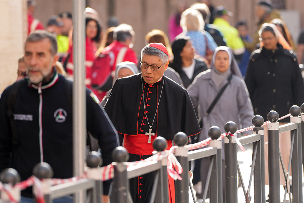 Cardinal Stephen Chow Sau-yan of Hong Kong approaches the Petriano entrance next to St. Peter’s Square to attend a general congregation meeting in the New Synod Hall at the Vatican April 25, 2025. (CNS/Lola Gomez)