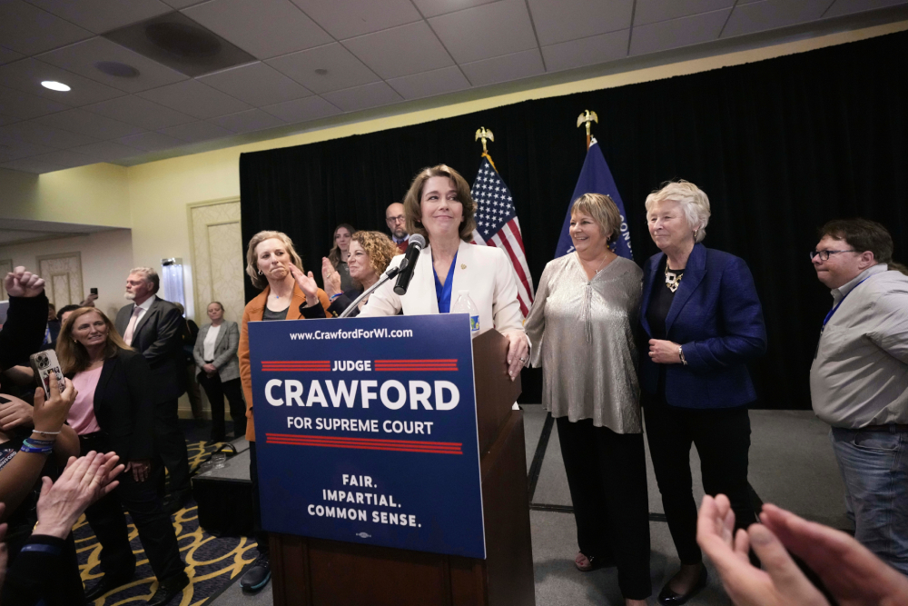 Wisconsin Supreme Court candidate Susan Crawford Wisconsin Supreme Court candidate Susan Crawford, surrounded by smiling staffers and clapping voters, speaks during her election night party after winning the election Tuesday, April 1, 2025, in Madison, Wis. (AP Photo/Kayla Wolf)