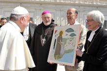 Cardinal Anders Arborelius of Stockholm and Lutheran Archbishop Antje Jackelen of Uppsala, primate of the Church of Sweden, present Pope Francis with an icon of St. Francis of Assisi following the pope's general audience June 14, 2017, at the Vatican. The artist, Lars Gerdmar, held the icon during the presentation of the gift, which was an expression of gratitude for Pope Francis' visit to Sweden in October 2016. (CNS/L'Osservatore Romano)