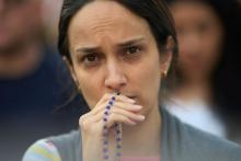 woman with rosary