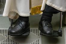 Pope Francis' shoes are seen in a photo as he greets visitors during his weekly general audience in the Paul VI Audience Hall at the Vatican May 1, 2024. (CNS/Pablo Esparza)